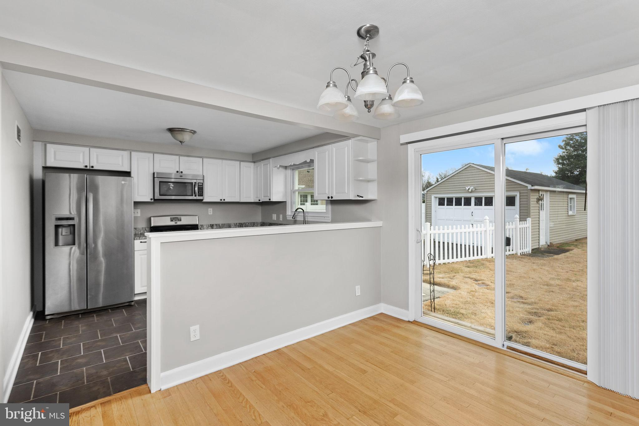 81 Wittenborn Avenue Hamilton, NJ 08619 - Photo 10 of 24 a view of a kitchen with a sink and refrigerator
