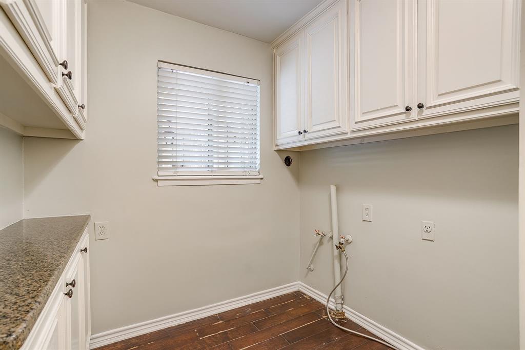 4316 West Clayton Road Fort Worth, TX 76116 - Photo 34 of 37 Laundry room offers great storage