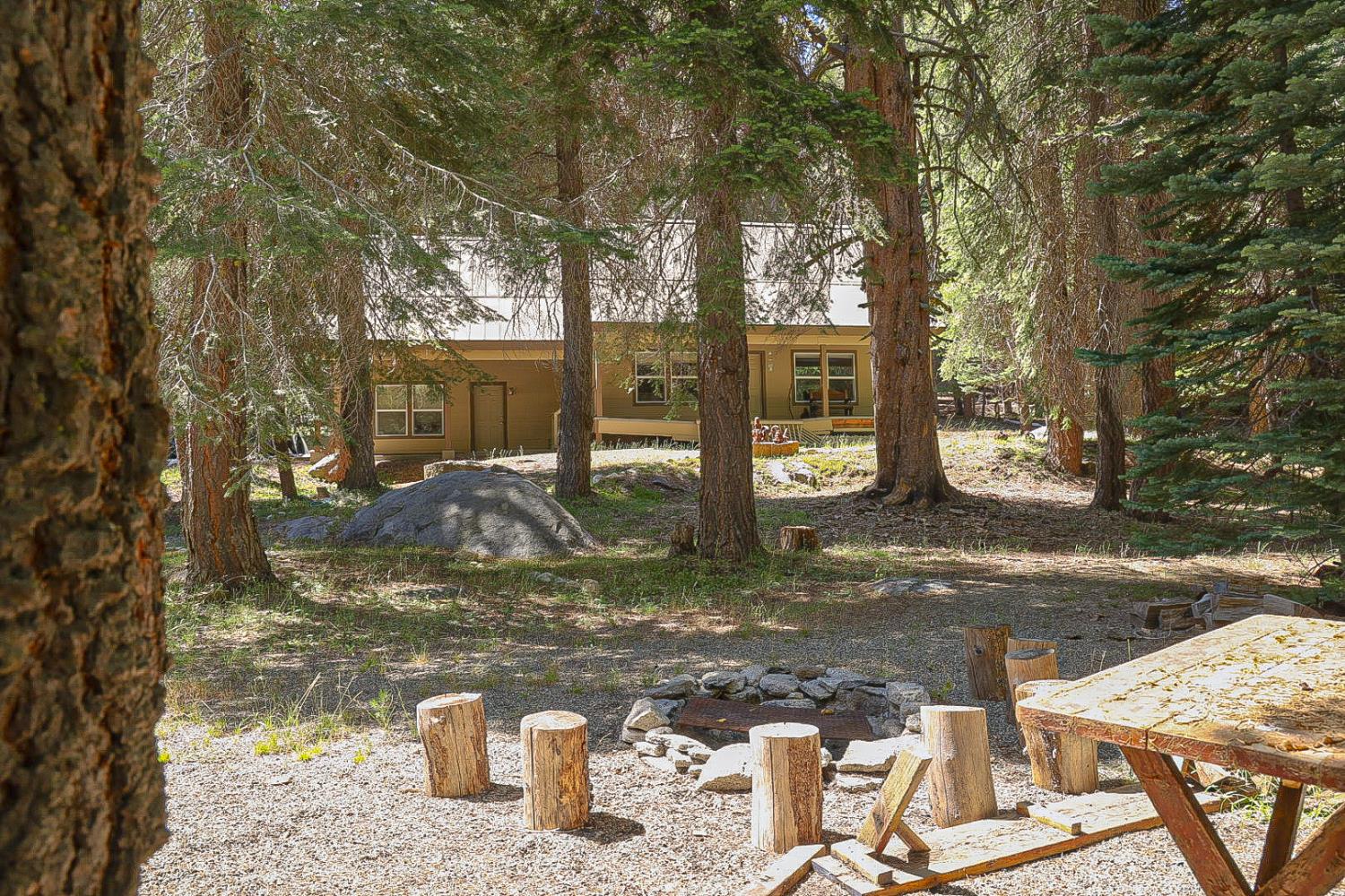 67922 Beasore Road Bass Lake, CA 93604 - Photo 26 of 39 a view of a house with backyard