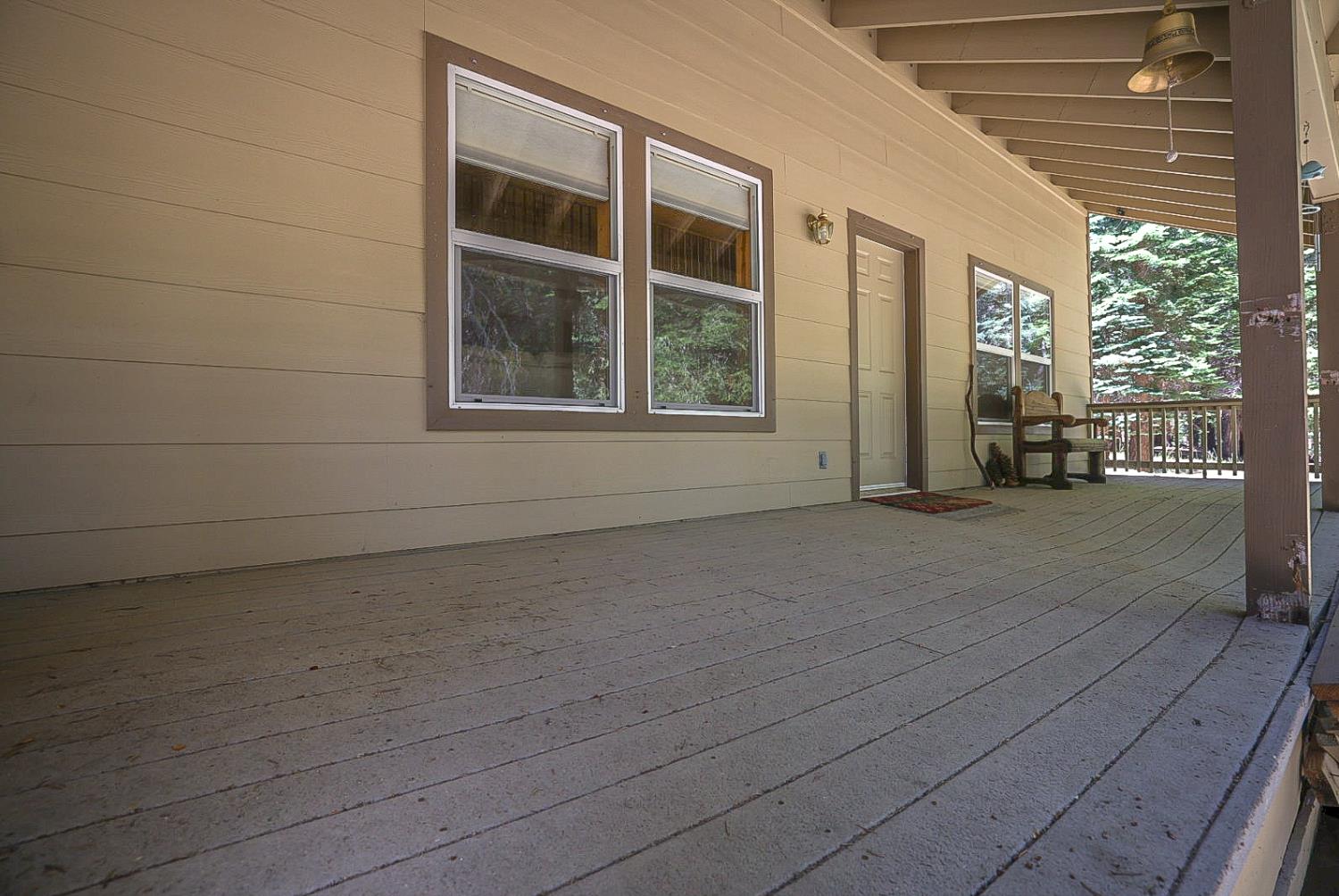 67922 Beasore Road Bass Lake, CA 93604 - Photo 6 of 39 a view of a house with a large window