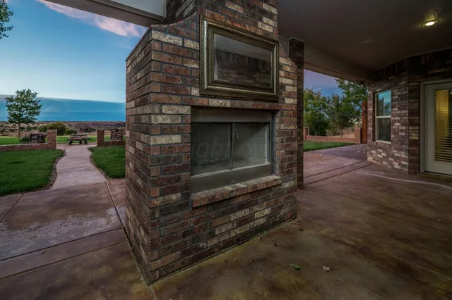 a view of a fireplace with a sink and dishwasher