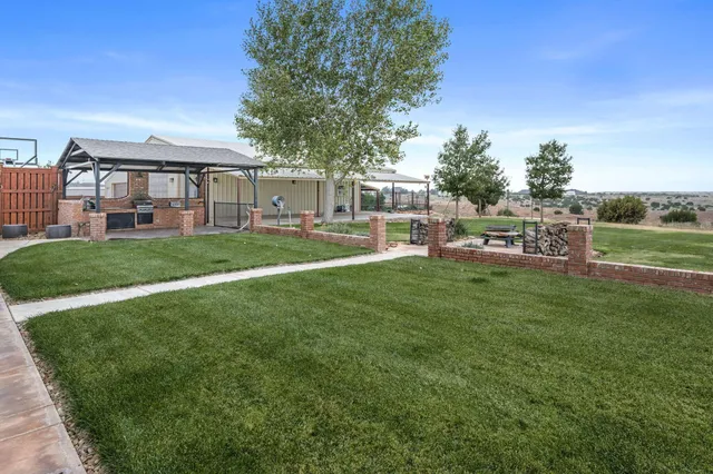 a backyard of a house with lots of green space