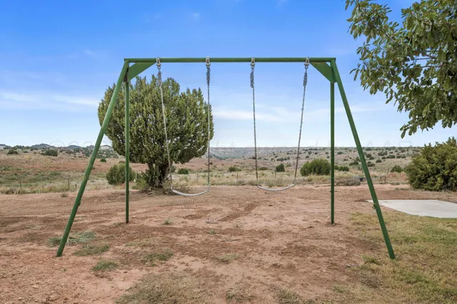 a living room with furniture and windows