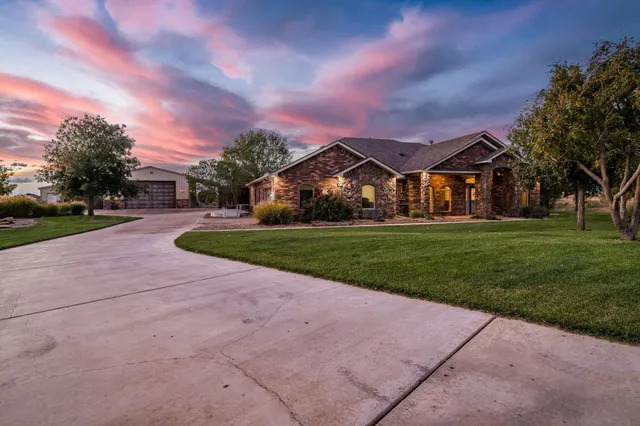 a front view of a house with yard