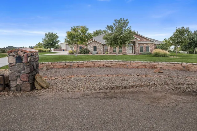 a view of outdoor space with deck and tree