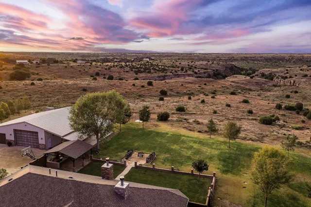 an aerial view of residential house with outdoor space