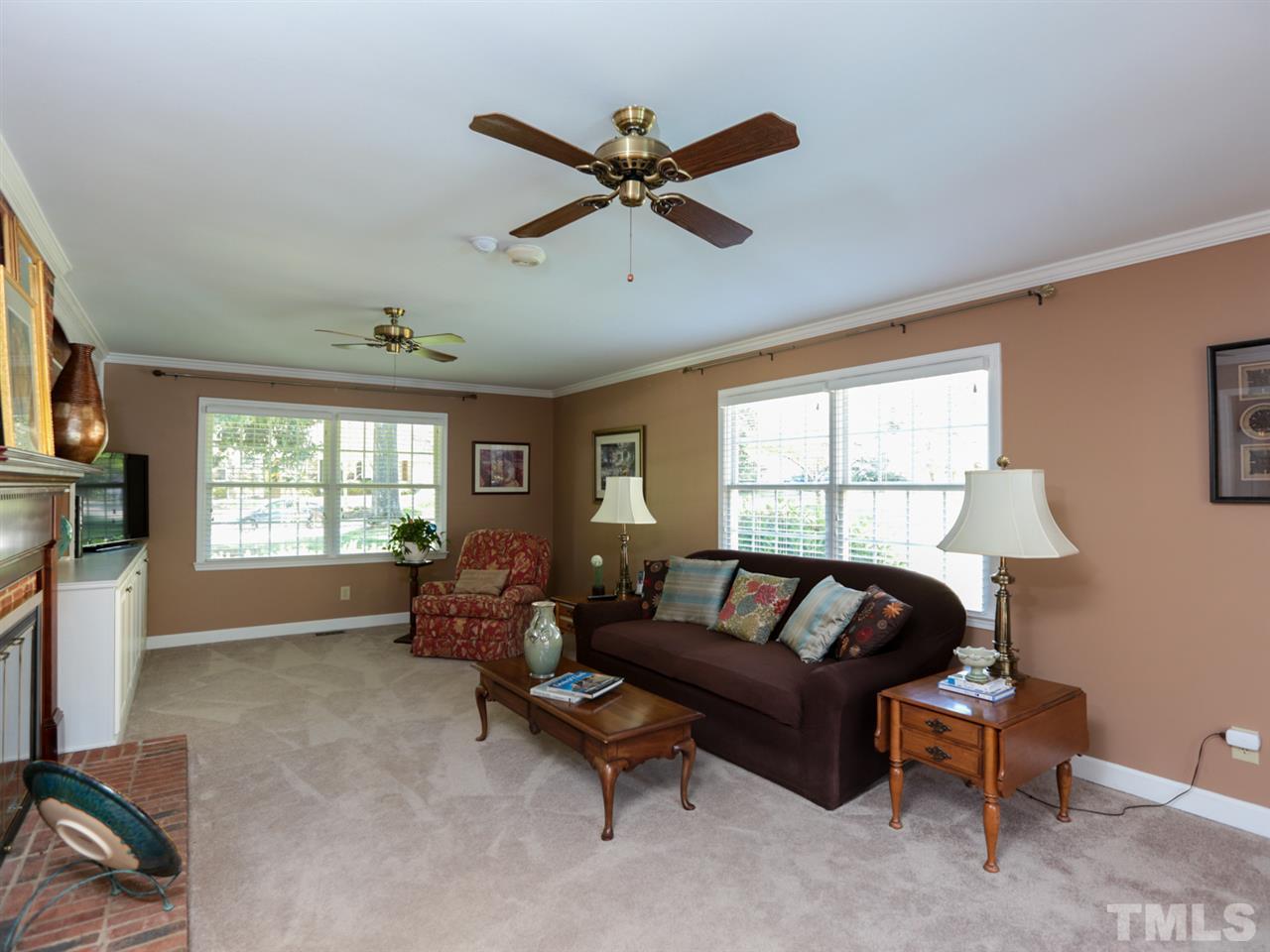 1413 Pony Run Road Raleigh, NC 27615 - Photo 9 of 25 a living room with furniture and a large window