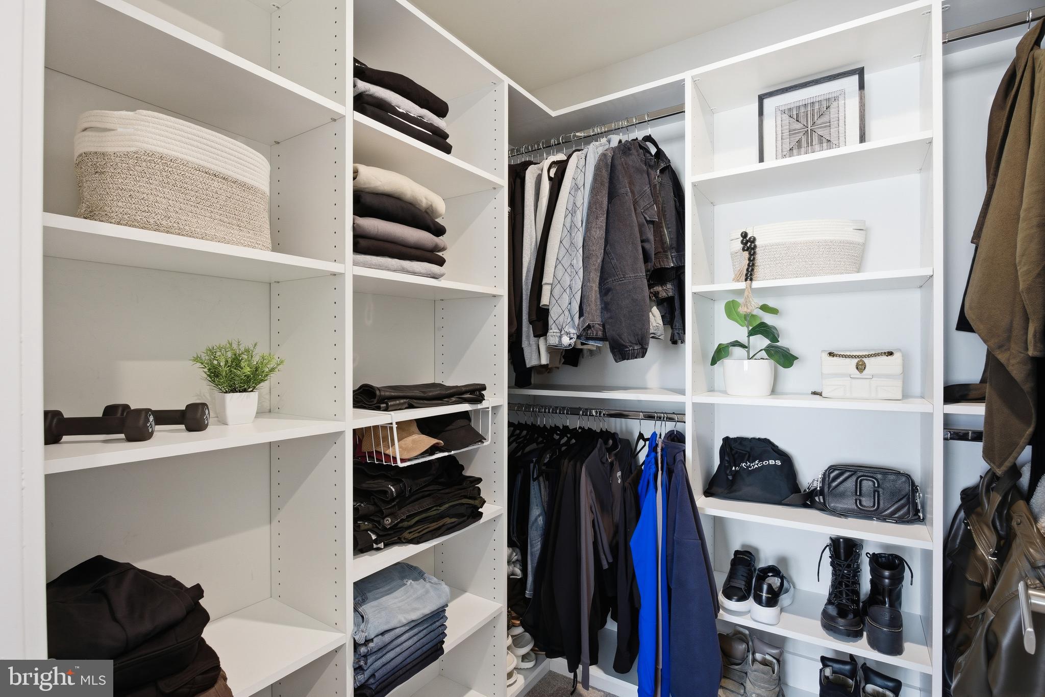 103 Freedom Way Sicklerville, NJ 08081 - Photo 23 of 43 a view of walk in closet with clothes and shoes
