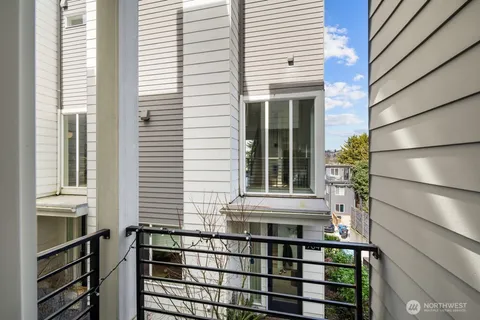 a view of balcony with a potted plant