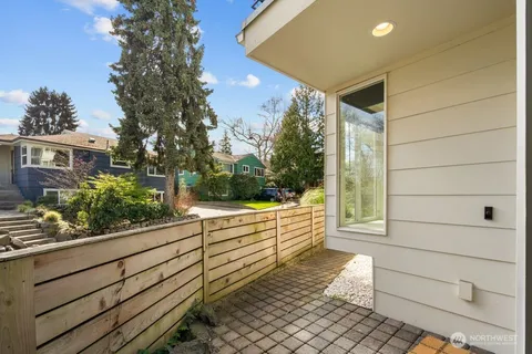 a view of a back yard from a balcony