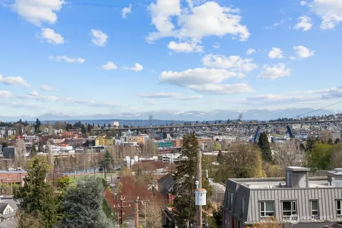 a view of a city with tall buildings