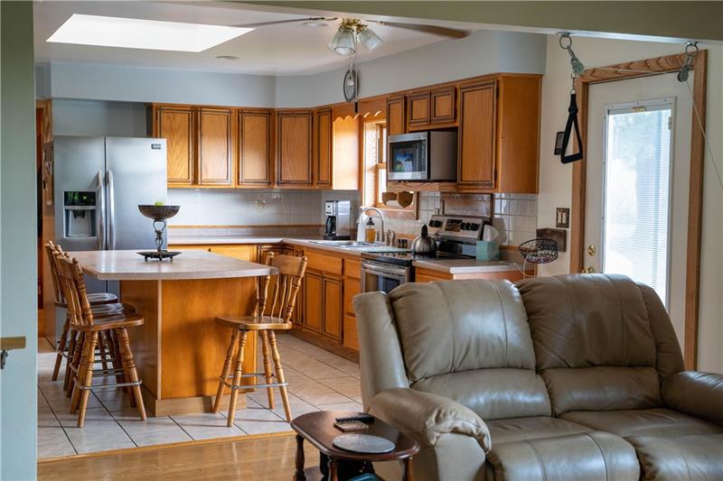 1276 Foster Road Volant, PA 16156 - Photo 14 of 24 Stainless appliances complement the traditional appeal of the cabinets.