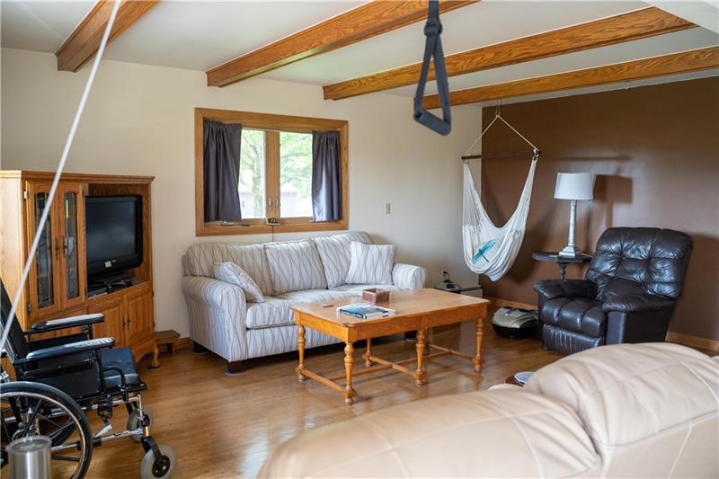 1276 Foster Road Volant, PA 16156 - Photo 16 of 24 Spacious living area is light and bright.