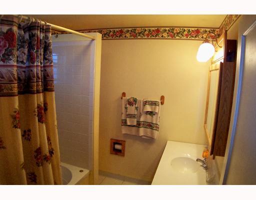 1440 Ridge Avenue Coraopolis, PA 15108 - Photo 5 of 8 Master Bath/Spa. UPDATED CERAMIC-TILED BATHROOM RIGHT OFF OF MASTER BEDROOM-EXTRA WIDE TUB AND SHOWER TO RELAX AND ESCAPE FROM DAILY STRESS