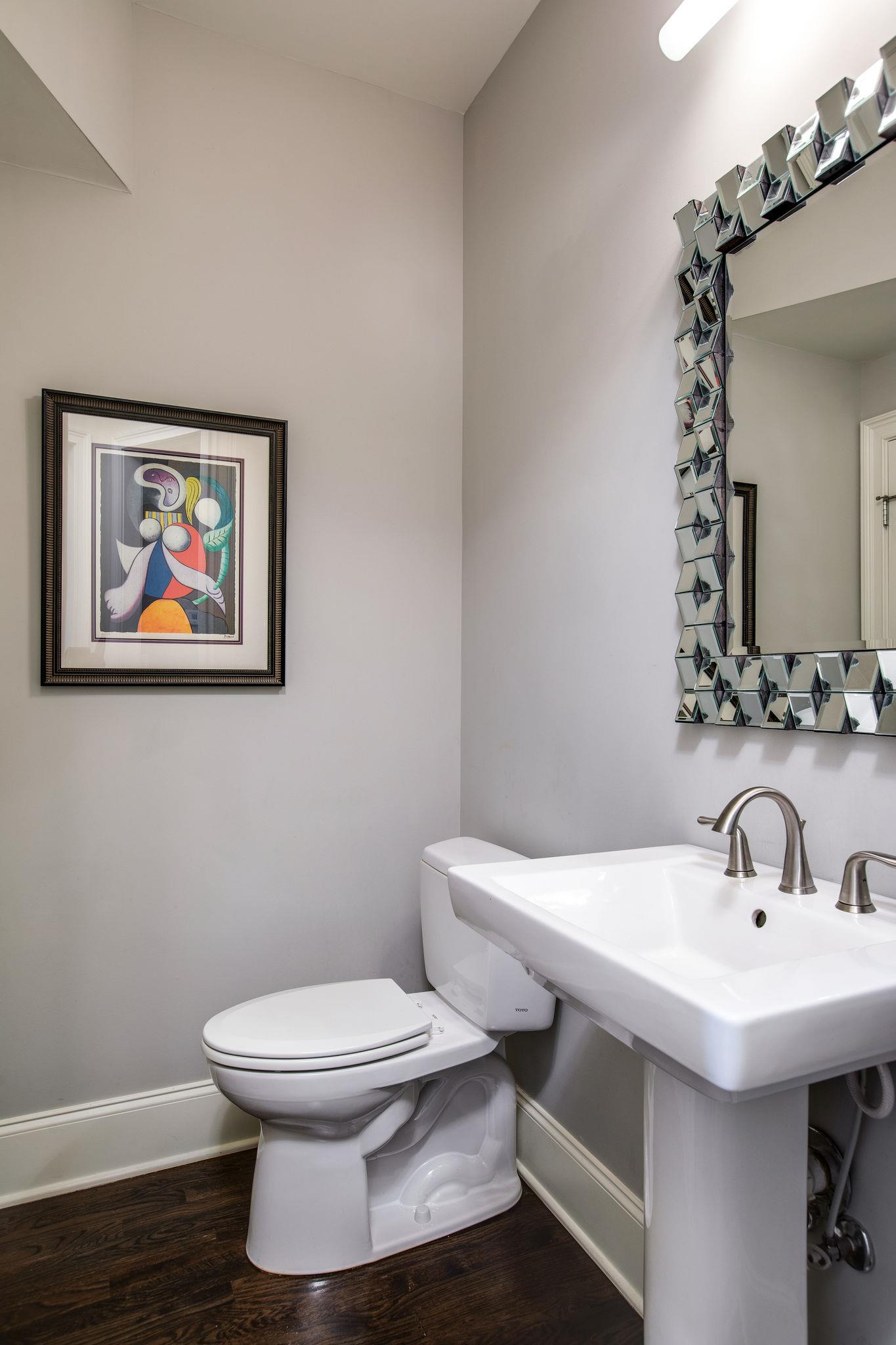 1367 Eliot Road Franklin, TN 37064 - Photo 15 of 30 a bathroom with a toilet a sink and mirror
