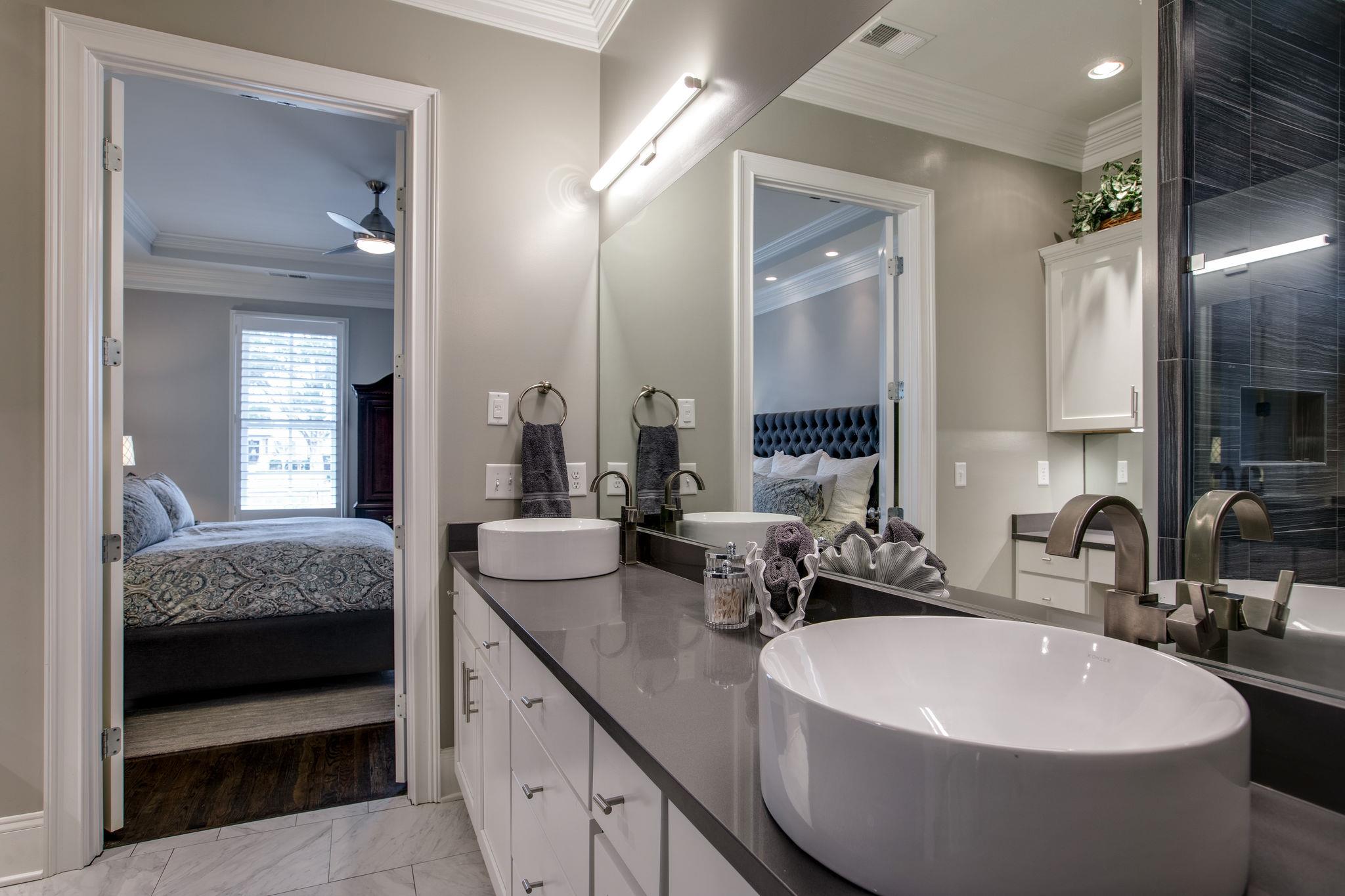 1367 Eliot Road Franklin, TN 37064 - Photo 19 of 30 a bathroom with double vanity sinks and a mirror