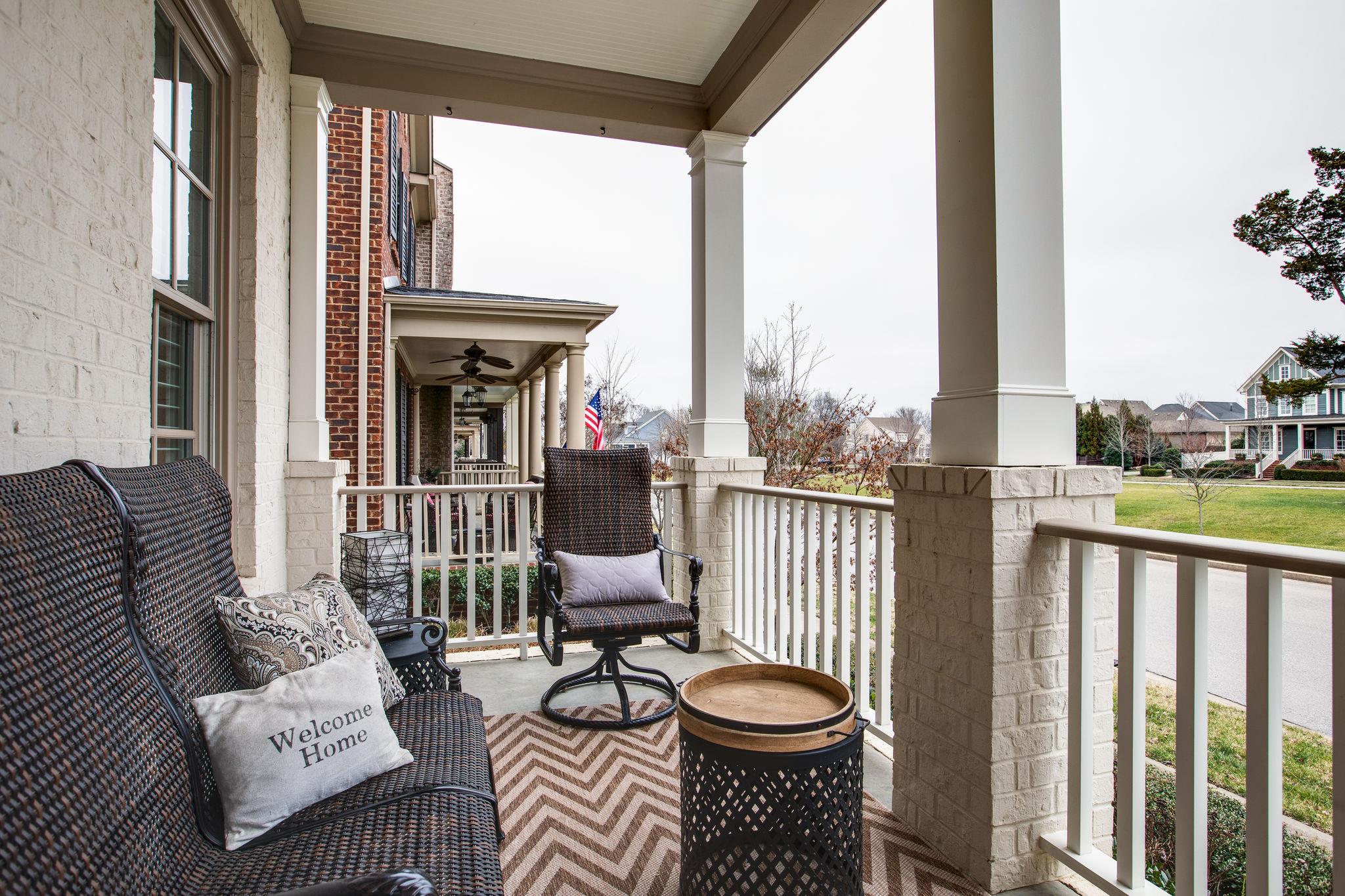 1367 Eliot Road Franklin, TN 37064 - Photo 3 of 30 a view of a balcony with chairs and iron floor
