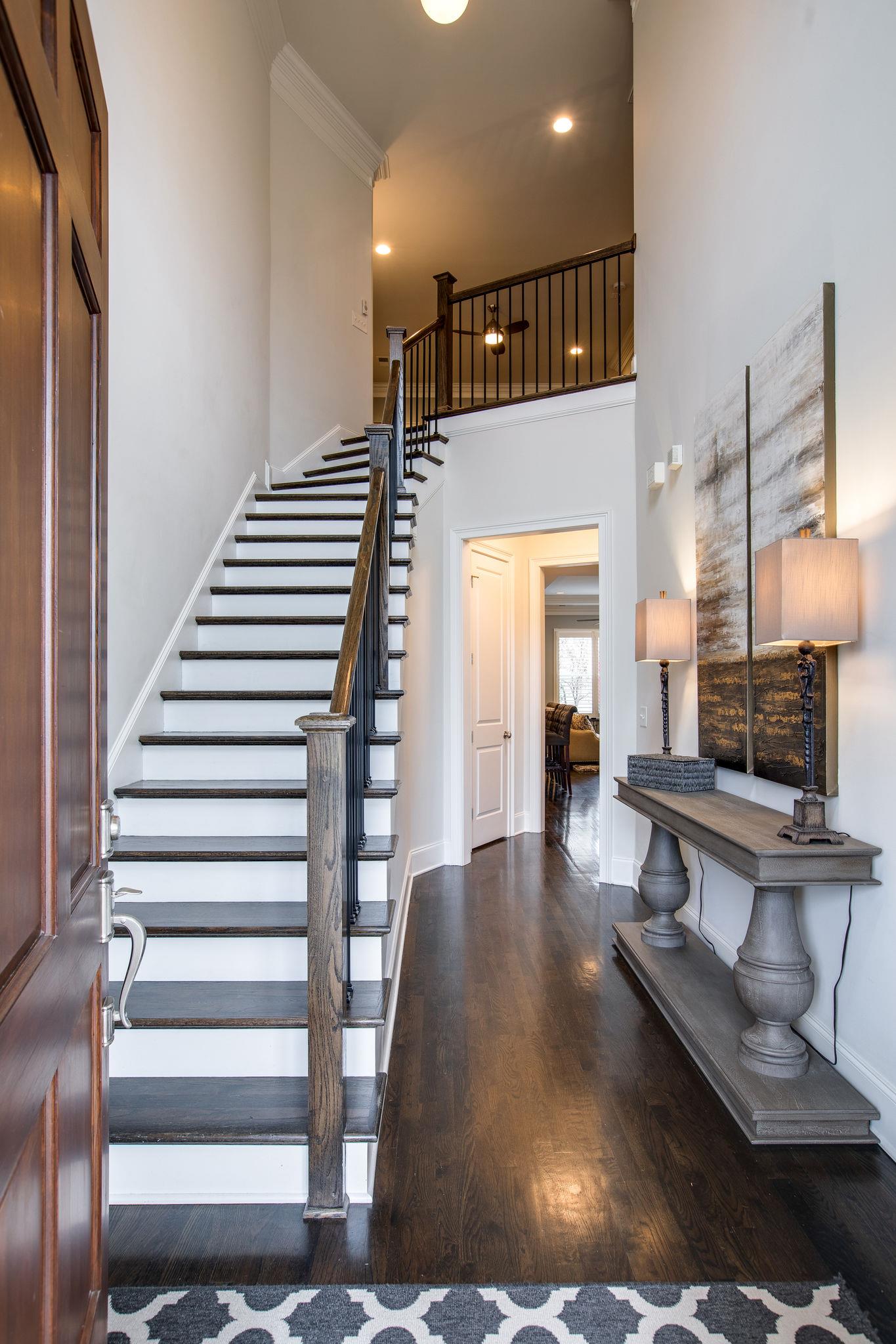 1367 Eliot Road Franklin, TN 37064 - Photo 22 of 30 a lobby with furniture and stairs