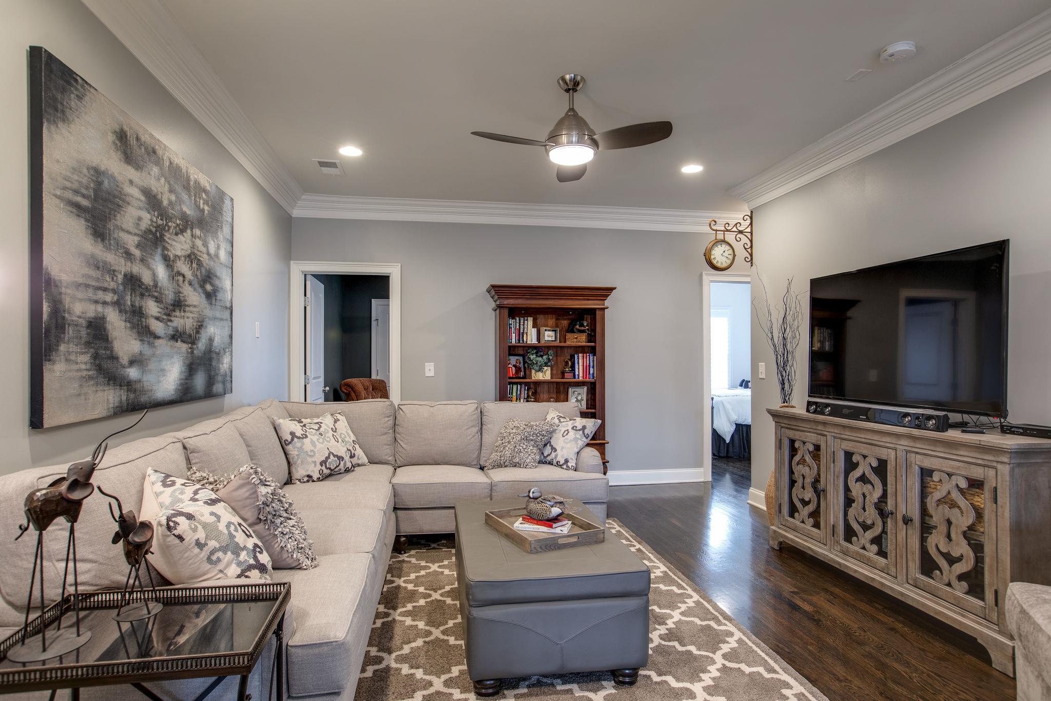 1367 Eliot Road Franklin, TN 37064 - Photo 23 of 30 a living room with furniture and a flat screen tv