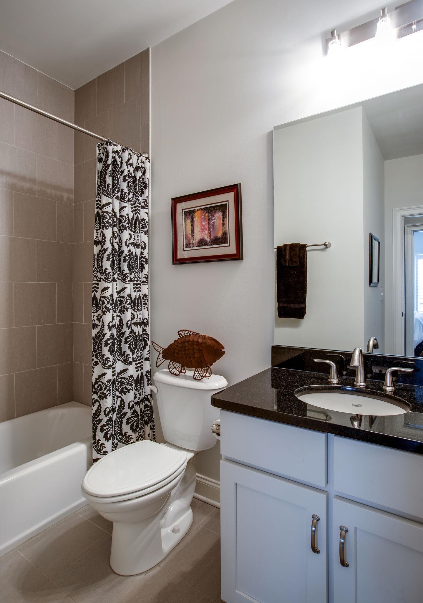 1367 Eliot Road Franklin, TN 37064 - Photo 28 of 30 a bathroom with a toilet a sink and a bathtub