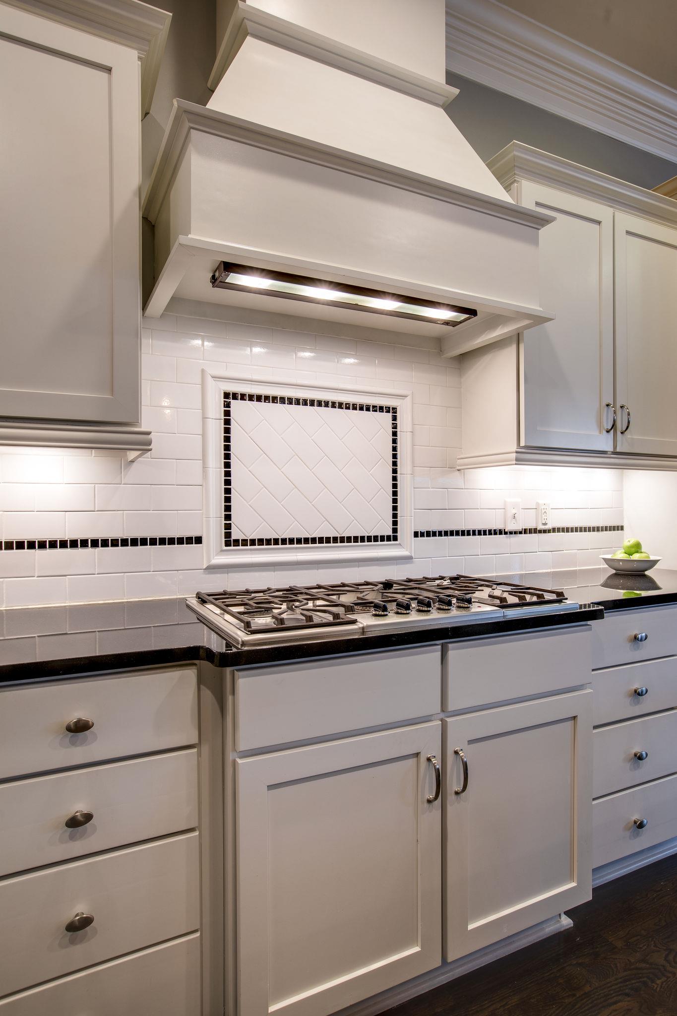 1367 Eliot Road Franklin, TN 37064 - Photo 8 of 30 a kitchen with granite countertop white cabinets and a sink