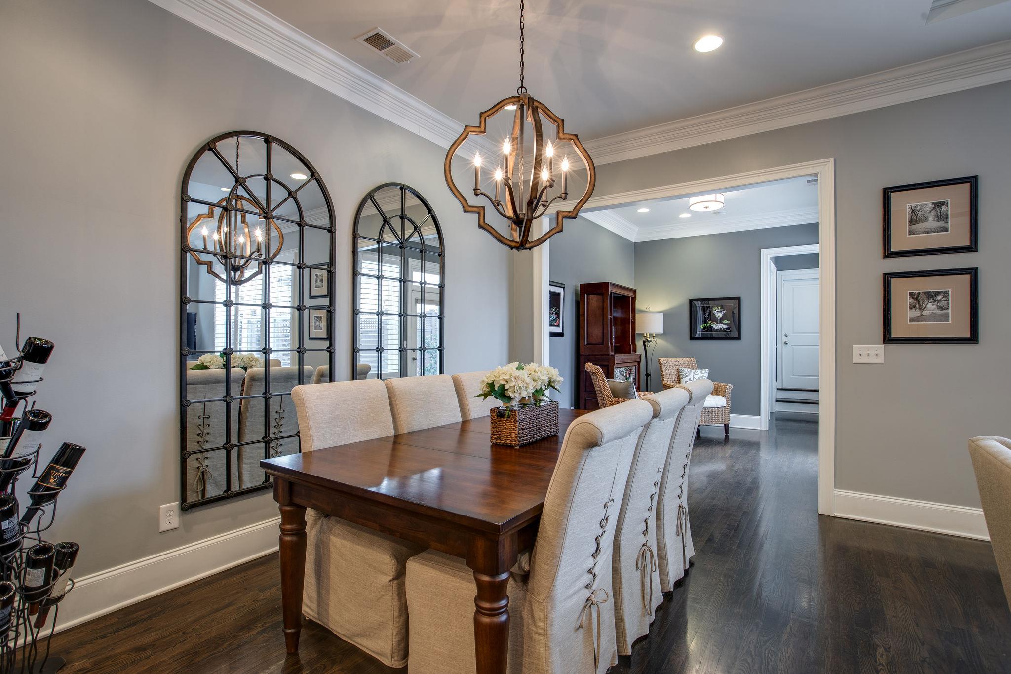 1367 Eliot Road Franklin, TN 37064 - Photo 9 of 30 a view of a dining room with furniture window and wooden floor