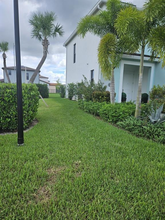 16542 Cove Road Loxahatchee, FL 33470 - Photo 27 of 33 Eastside of the House