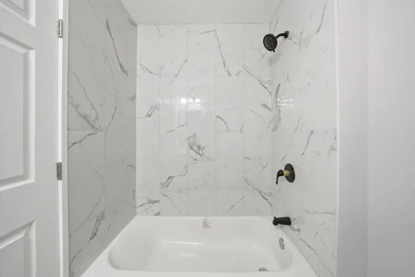 a bathroom with a bathtub