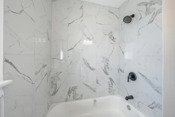 a bathroom with a bathtub