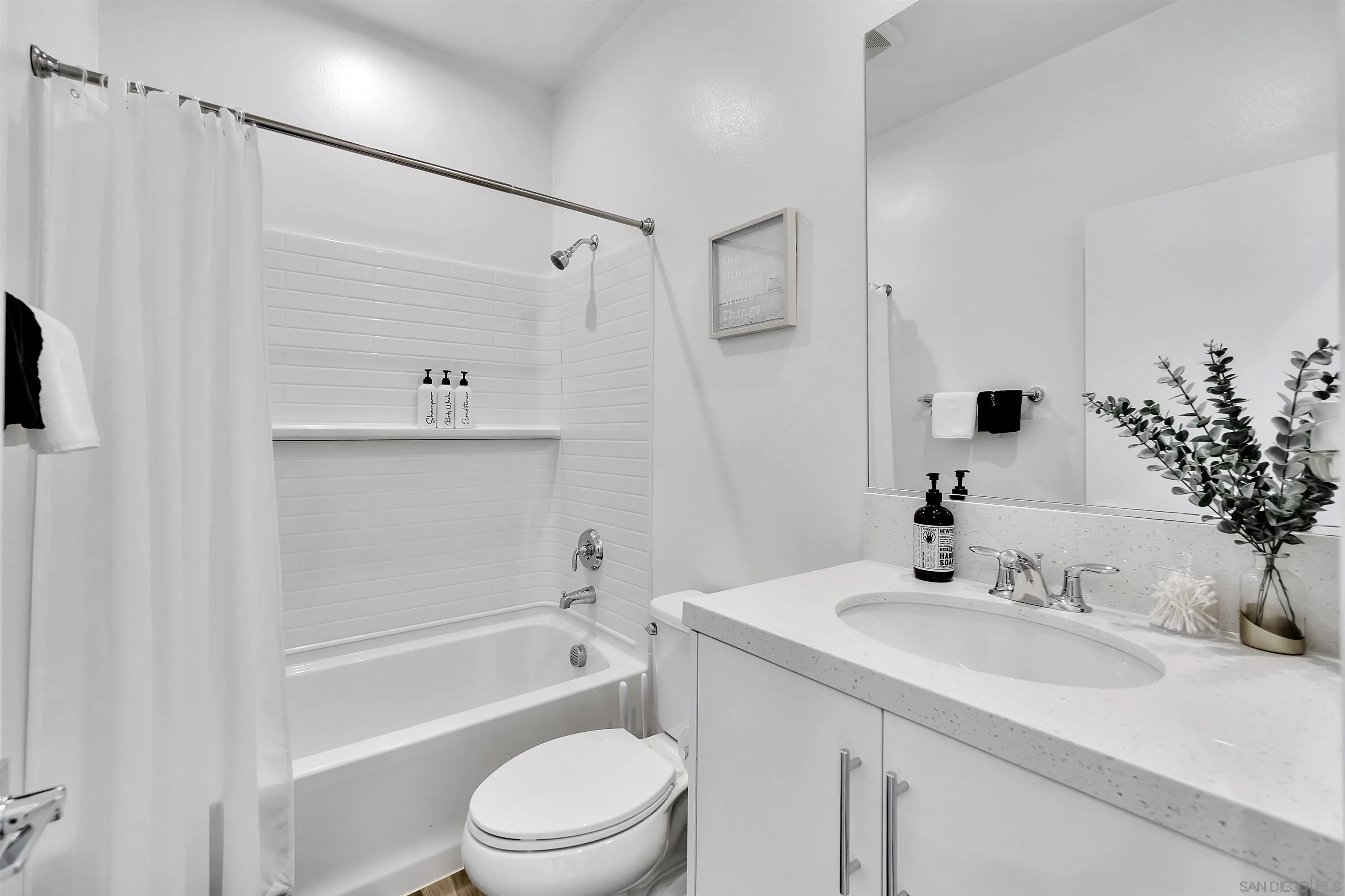 1531 West Bushell Street Anaheim, CA 92805 - Photo 13 of 27 a bathroom with a sink a toilet and shower