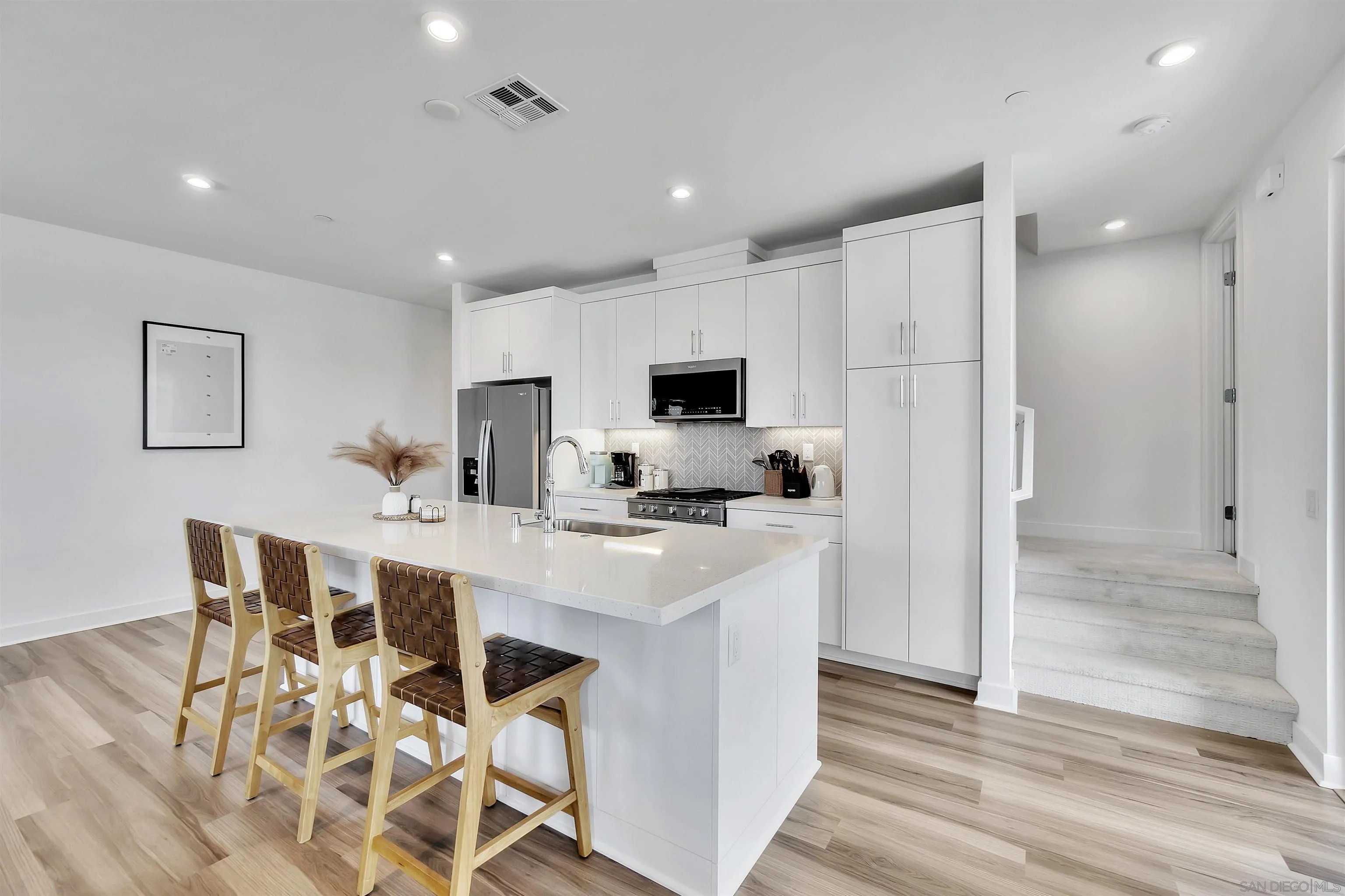 1531 West Bushell Street Anaheim, CA 92805 - Photo 6 of 27 a view of kitchen with kitchen island and stainless steel appliances