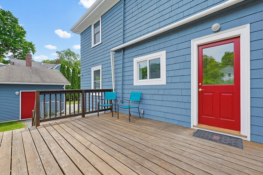10 Water Street Natick, MA 01760 - Photo 29 of 35 a view of backyard with a deck and wooden floor