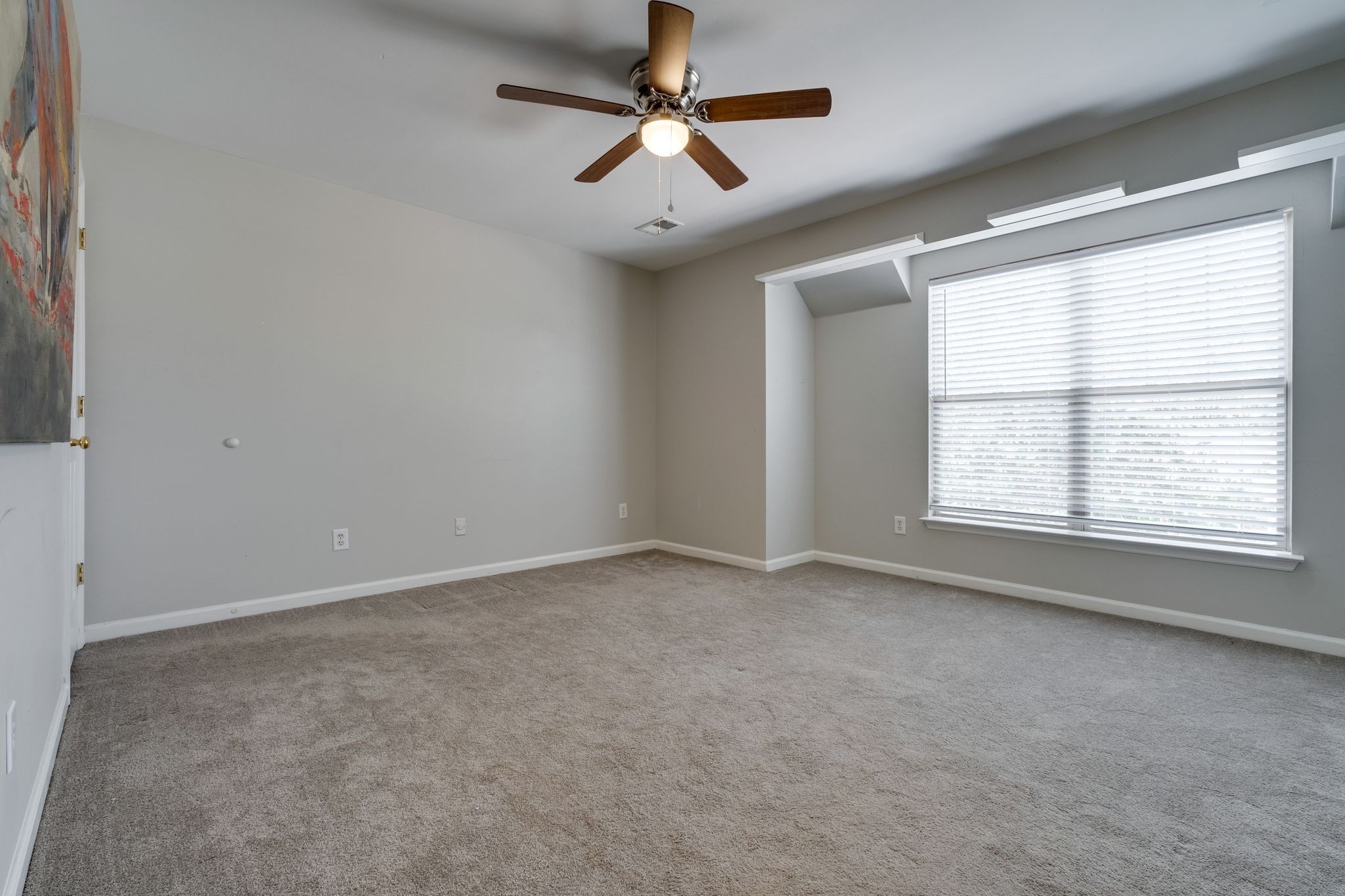3405 Old Anderson Road, Unit 116 Antioch, TN 37013 - Photo 20 of 31 Large bedroom 2 upstairs. Was used as a bonus/flex space. This is a large room with a walk-in closet. Lots of opportunity here!