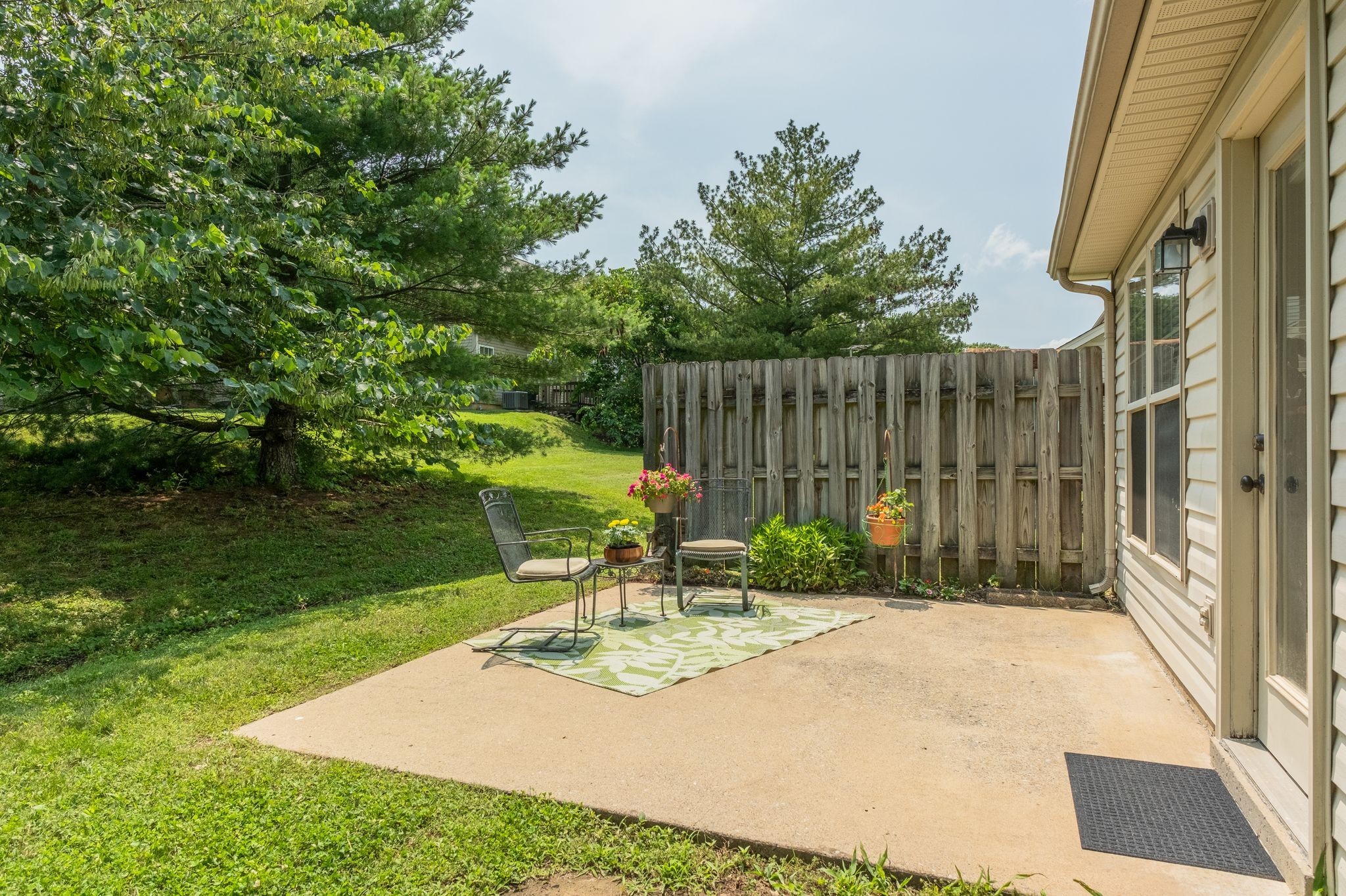 3405 Old Anderson Road, Unit 116 Antioch, TN 37013 - Photo 25 of 31 Wonderfull back patio with lots of privacy and nature views. Fantastic location in the community with green space beyond the trees pictured.