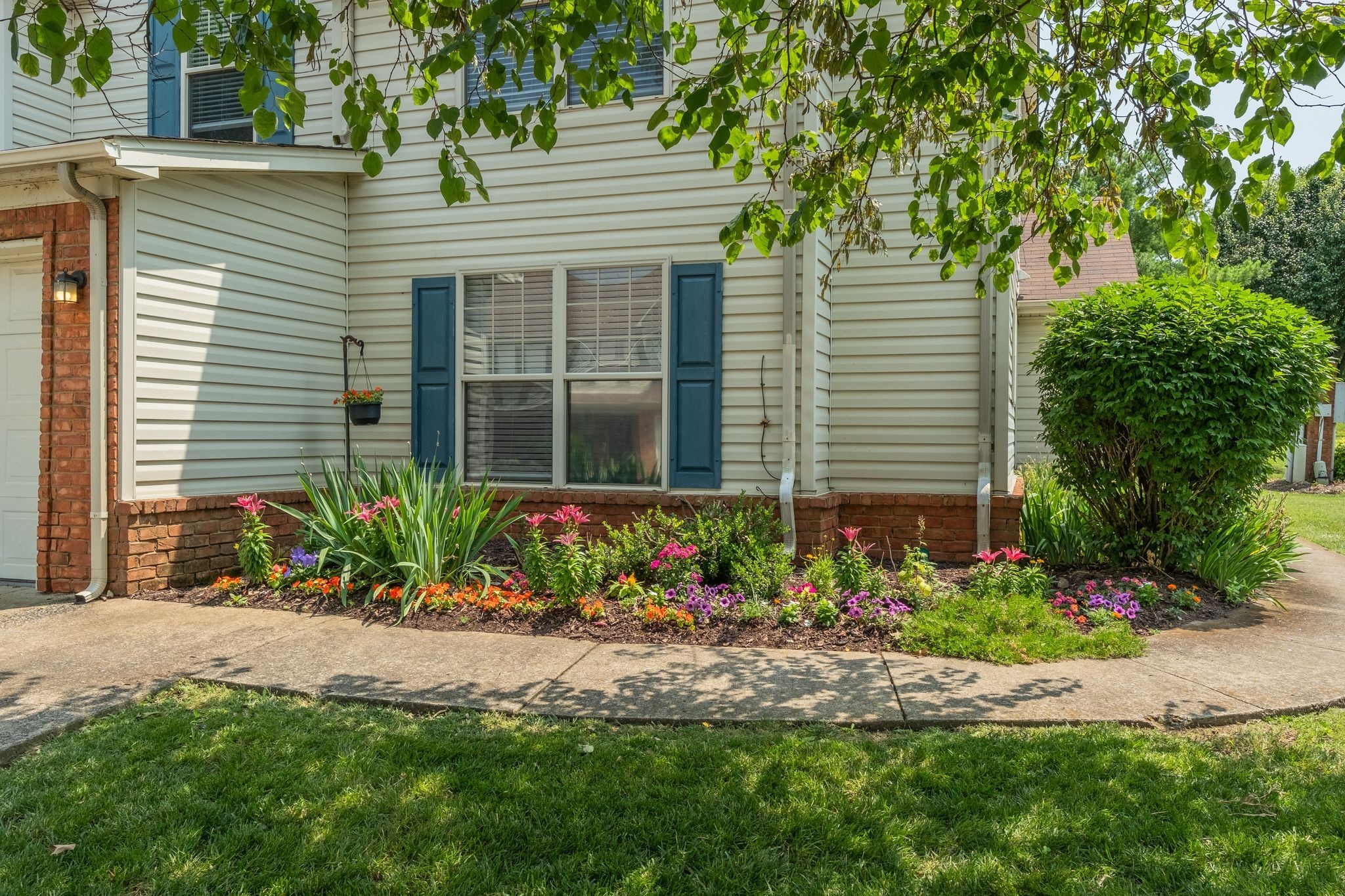3405 Old Anderson Road, Unit 116 Antioch, TN 37013 - Photo 29 of 31 Lovingly created flower gardens surround the property entrance.