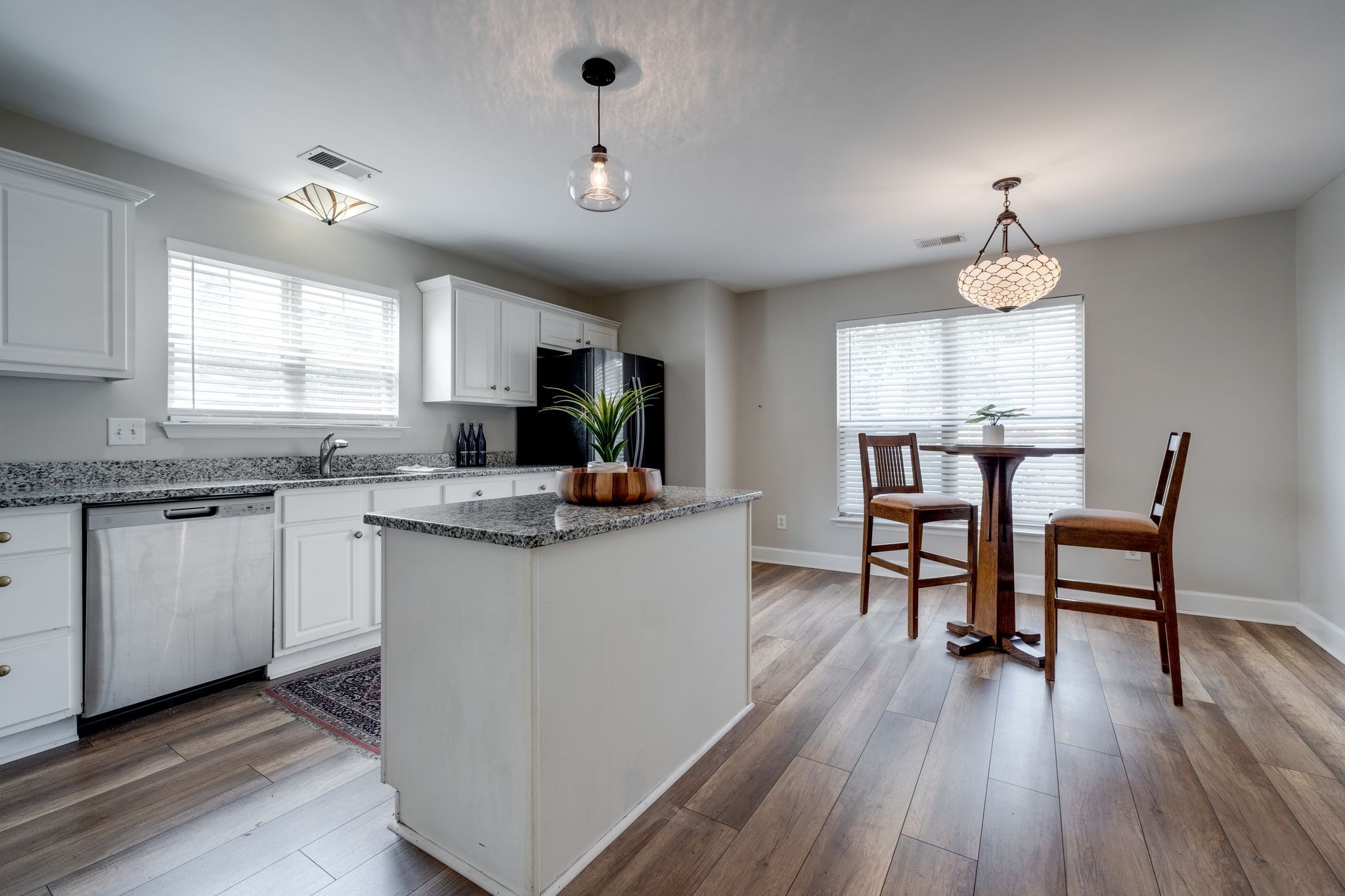 3405 Old Anderson Road, Unit 116 Antioch, TN 37013 - Photo 7 of 31 Big kitchen with loads of counter space and island. One can easily fit a table with chairs for family dining where the high-top table and chairs sit.