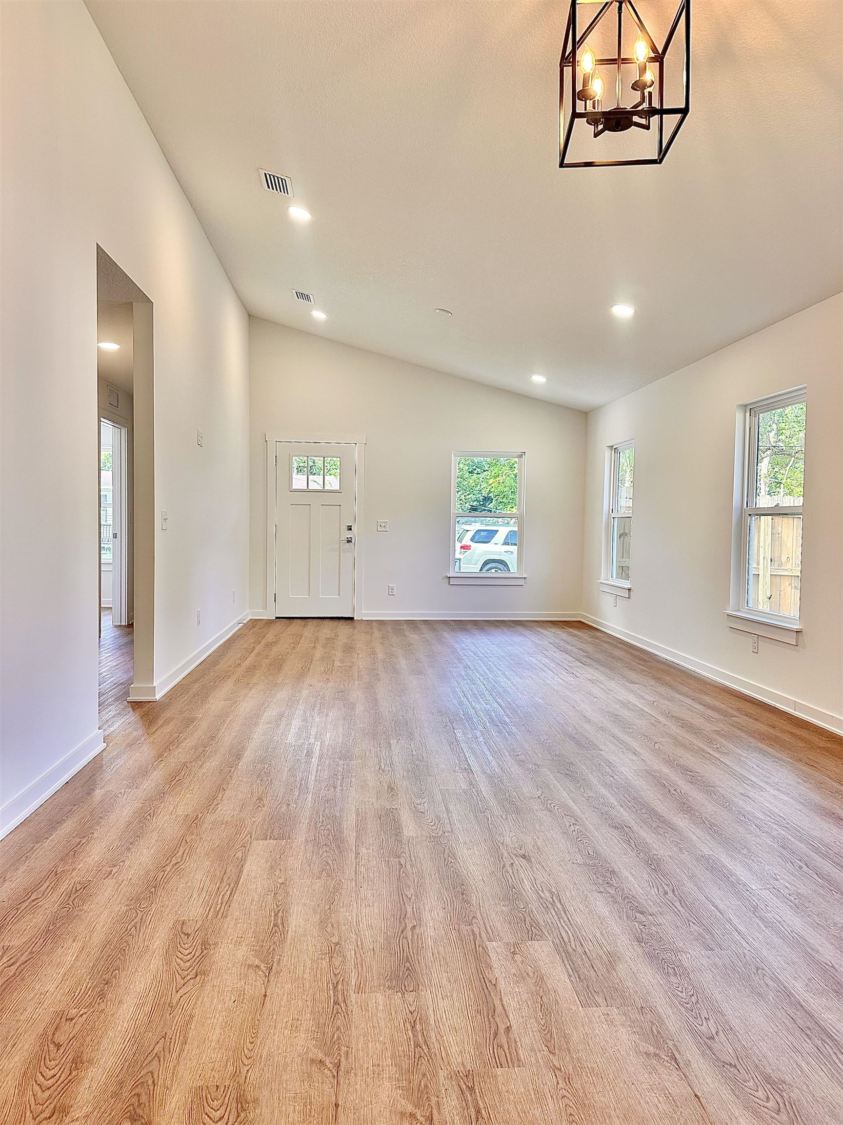 723 West 6th Street St. Augustine, FL 32084 - Photo 7 of 14 a view of empty room with wooden floor