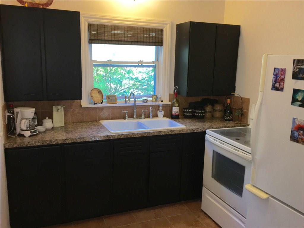117 Azalea Lane Rector, PA 15677 - Photo 13 of 25 Another angle of the Kitchen. The appliances are included with the sale of the property.