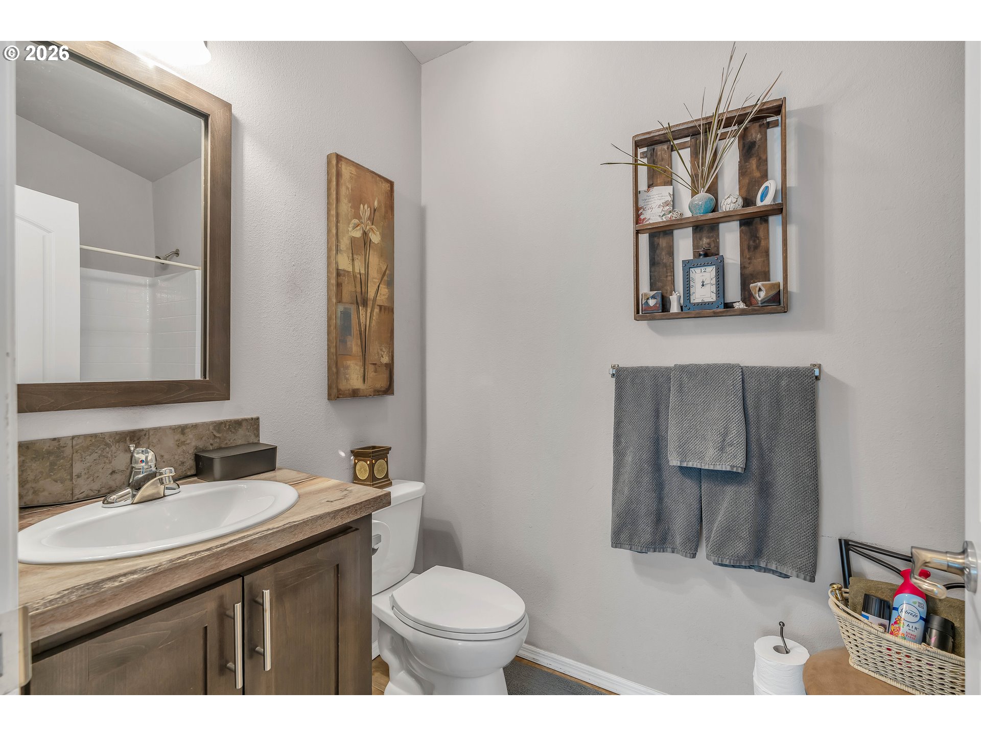 21494 Hideway Lane Rhododendron, OR 97049 - Photo 19 of 34 a bathroom with a toilet sink and mirror