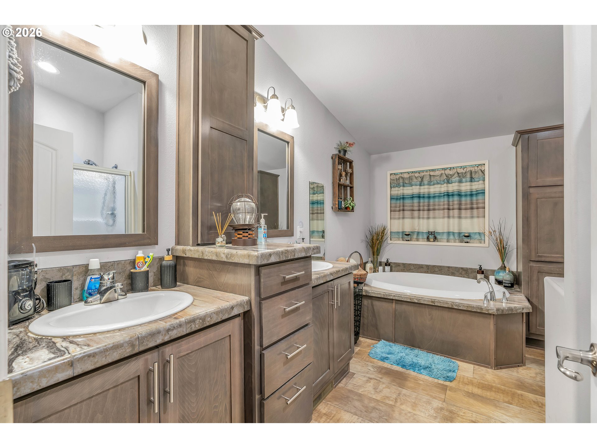 21494 Hideway Lane Rhododendron, OR 97049 - Photo 23 of 34 a bathroom with a granite countertop sink mirror and a bath tub
