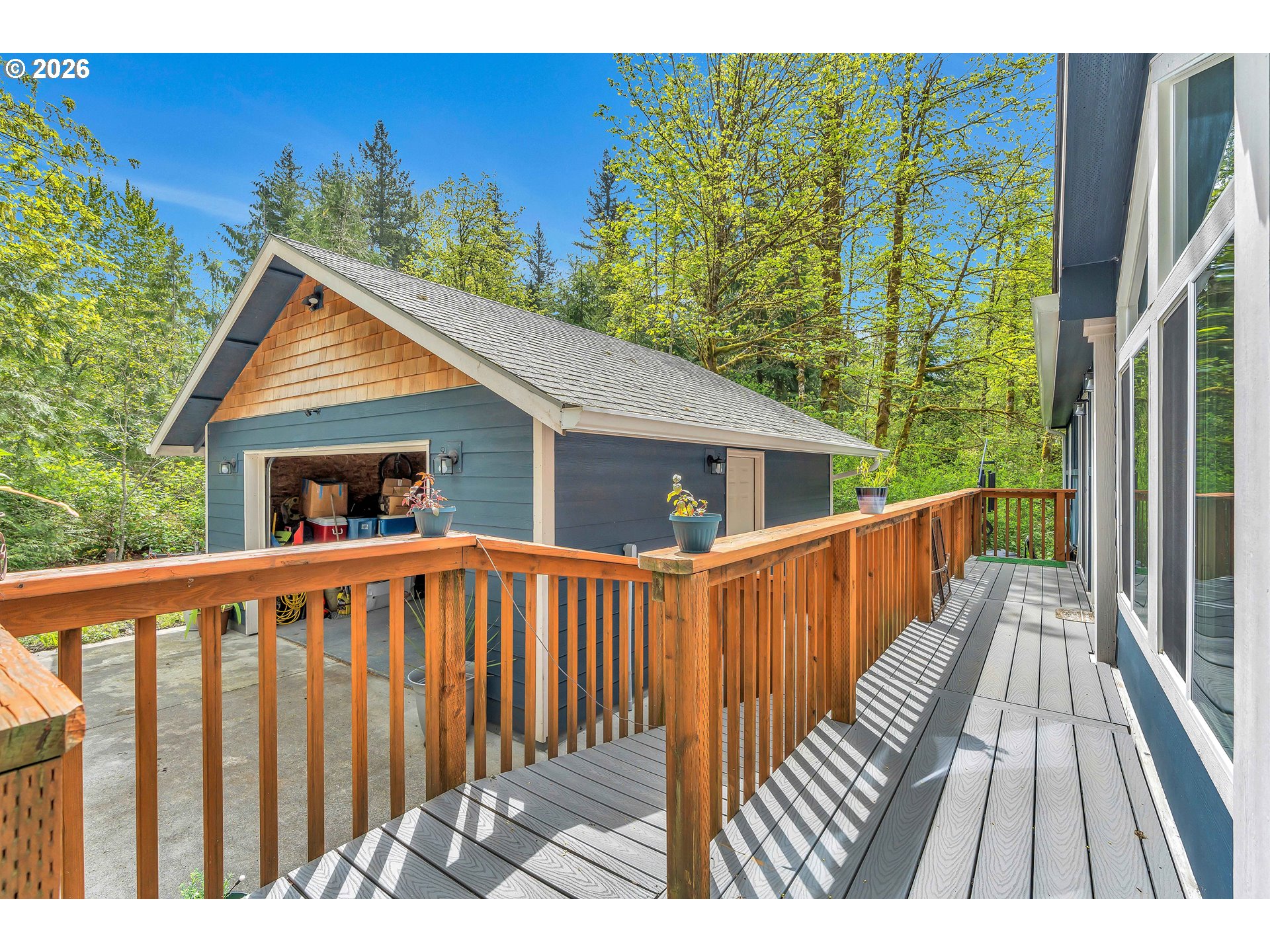 21494 Hideway Lane Rhododendron, OR 97049 - Photo 26 of 34 a view of wooden house with a deck