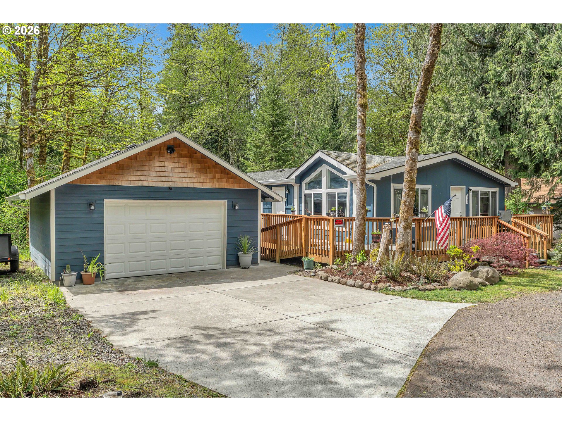 21494 Hideway Lane Rhododendron, OR 97049 - Photo 3 of 34 a view of a house with a yard