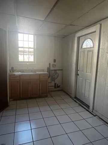 a bathroom with a sink a vanity and mirror