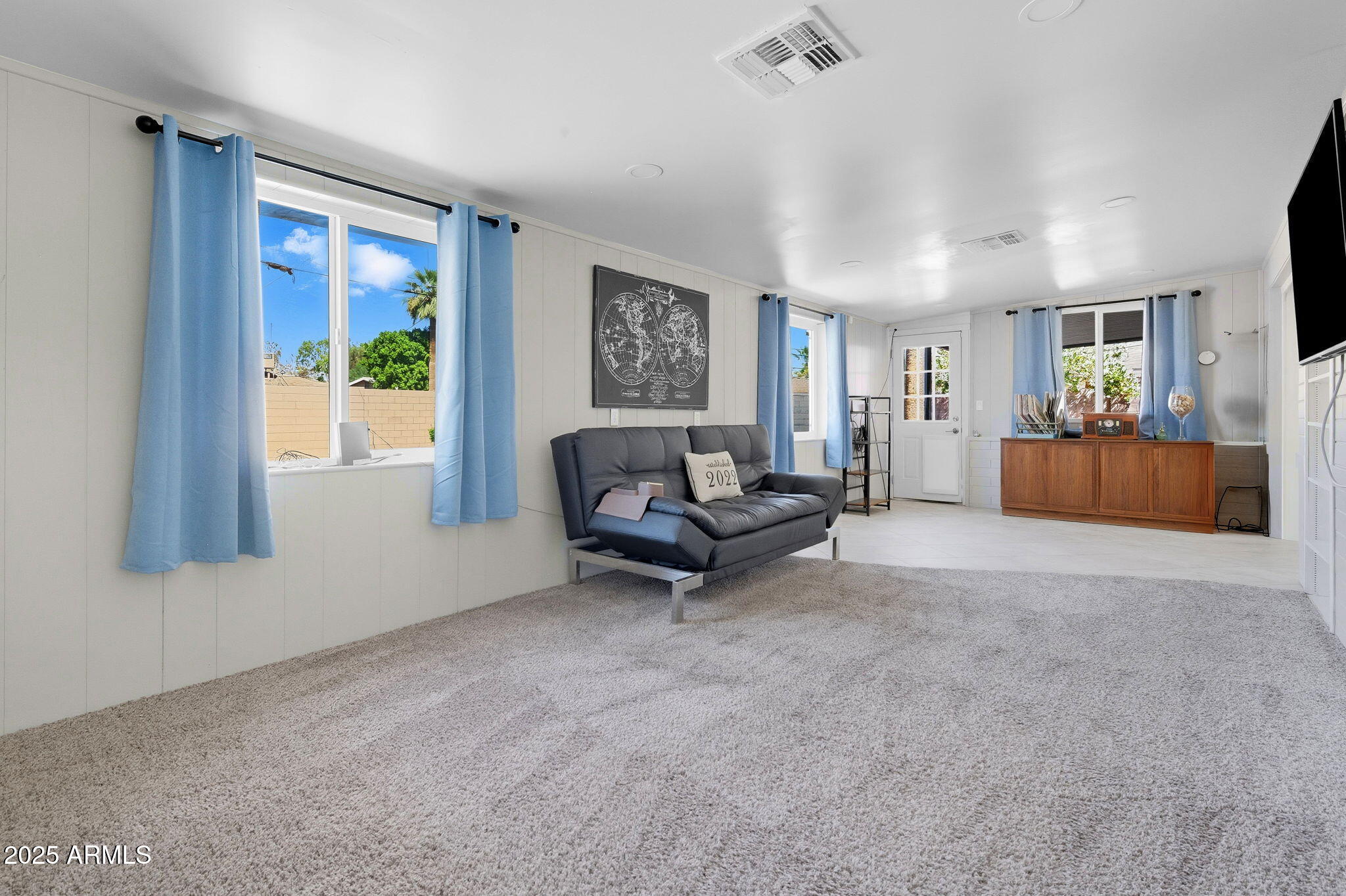 1802 East Meadowbrook Avenue Phoenix, AZ 85016 - Photo 12 of 28 a living room with furniture and a window