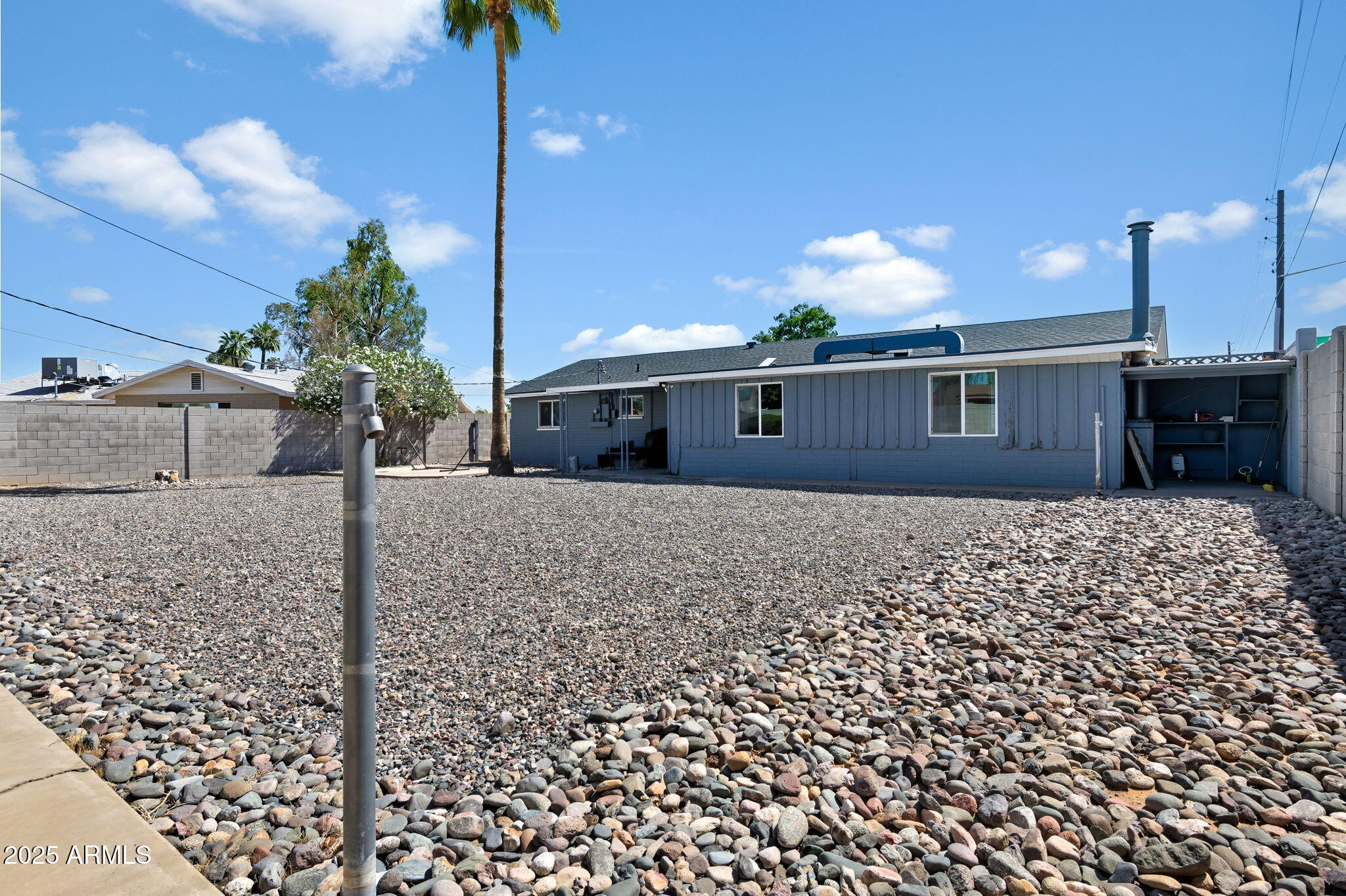 1802 East Meadowbrook Avenue Phoenix, AZ 85016 - Photo 22 of 28 a front view of a house with a yard