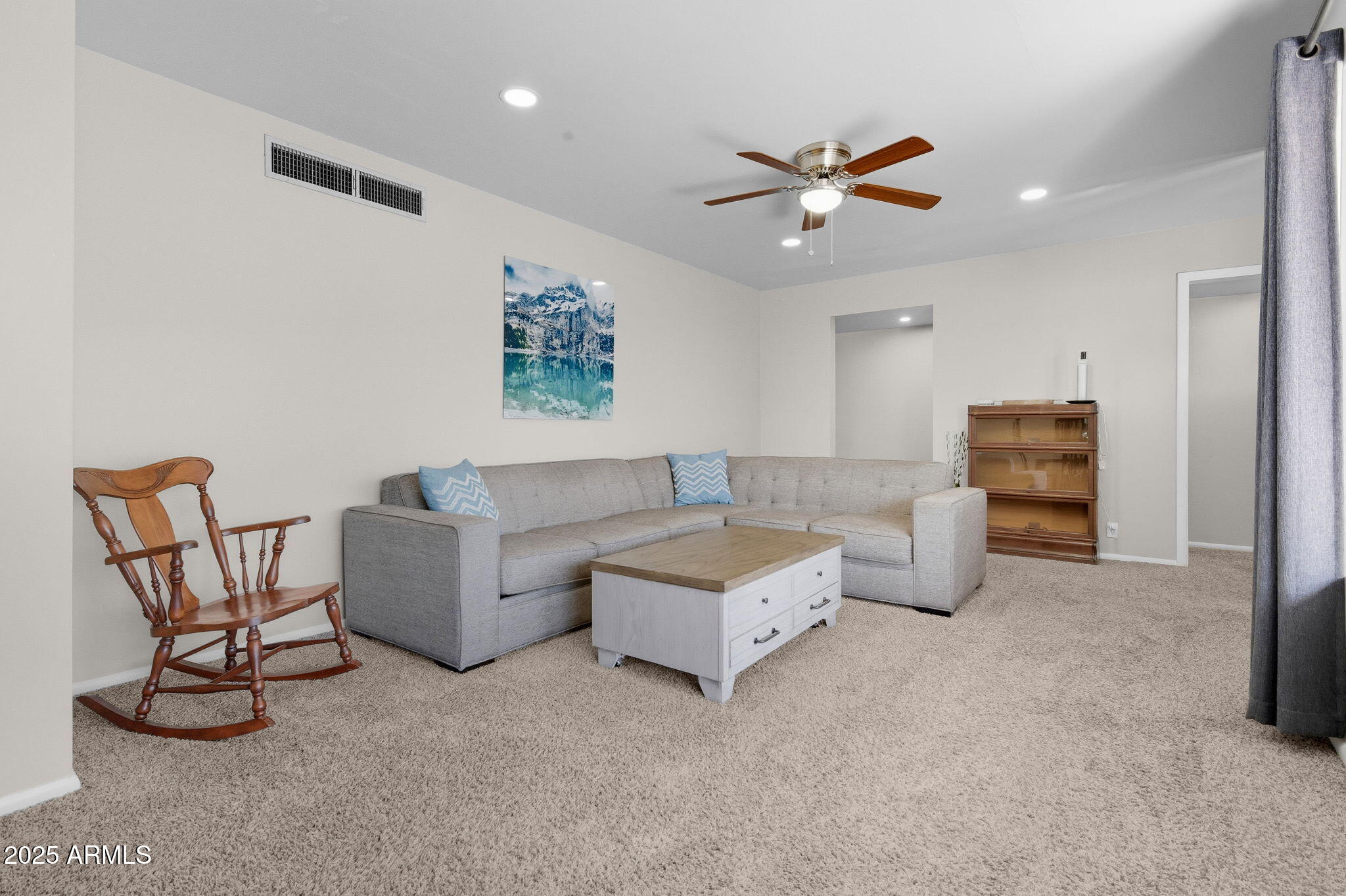 1802 East Meadowbrook Avenue Phoenix, AZ 85016 - Photo 4 of 28 a living room with furniture and a ceiling fan