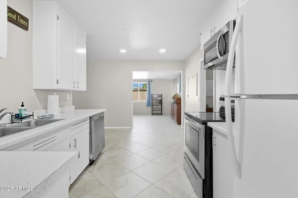 a view of a dining room with furniture