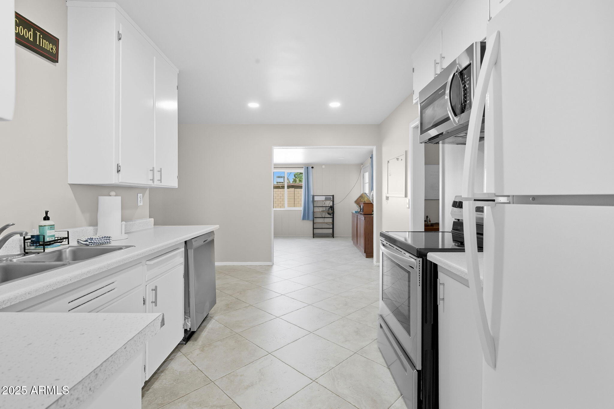 1802 East Meadowbrook Avenue Phoenix, AZ 85016 - Photo 6 of 28 a kitchen with a sink and cabinets