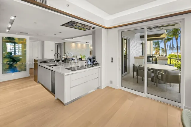 a view of a balcony dining table and chairs