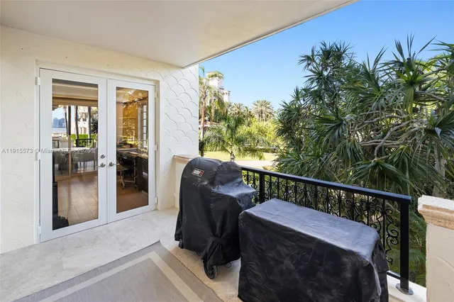 a bathroom with a shower sink and mirror